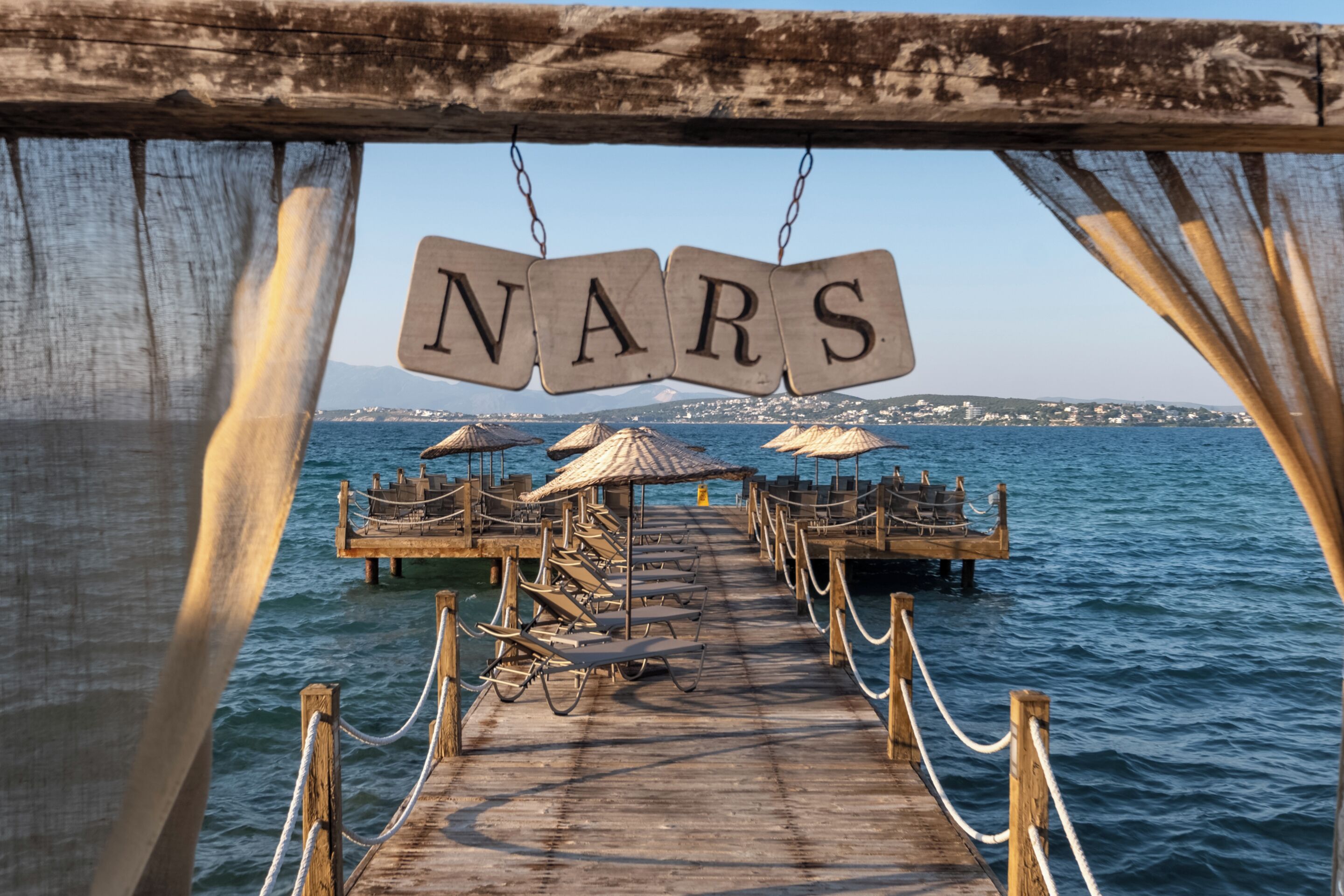 private beach, white sand, sun-loungers, beach umbrellas