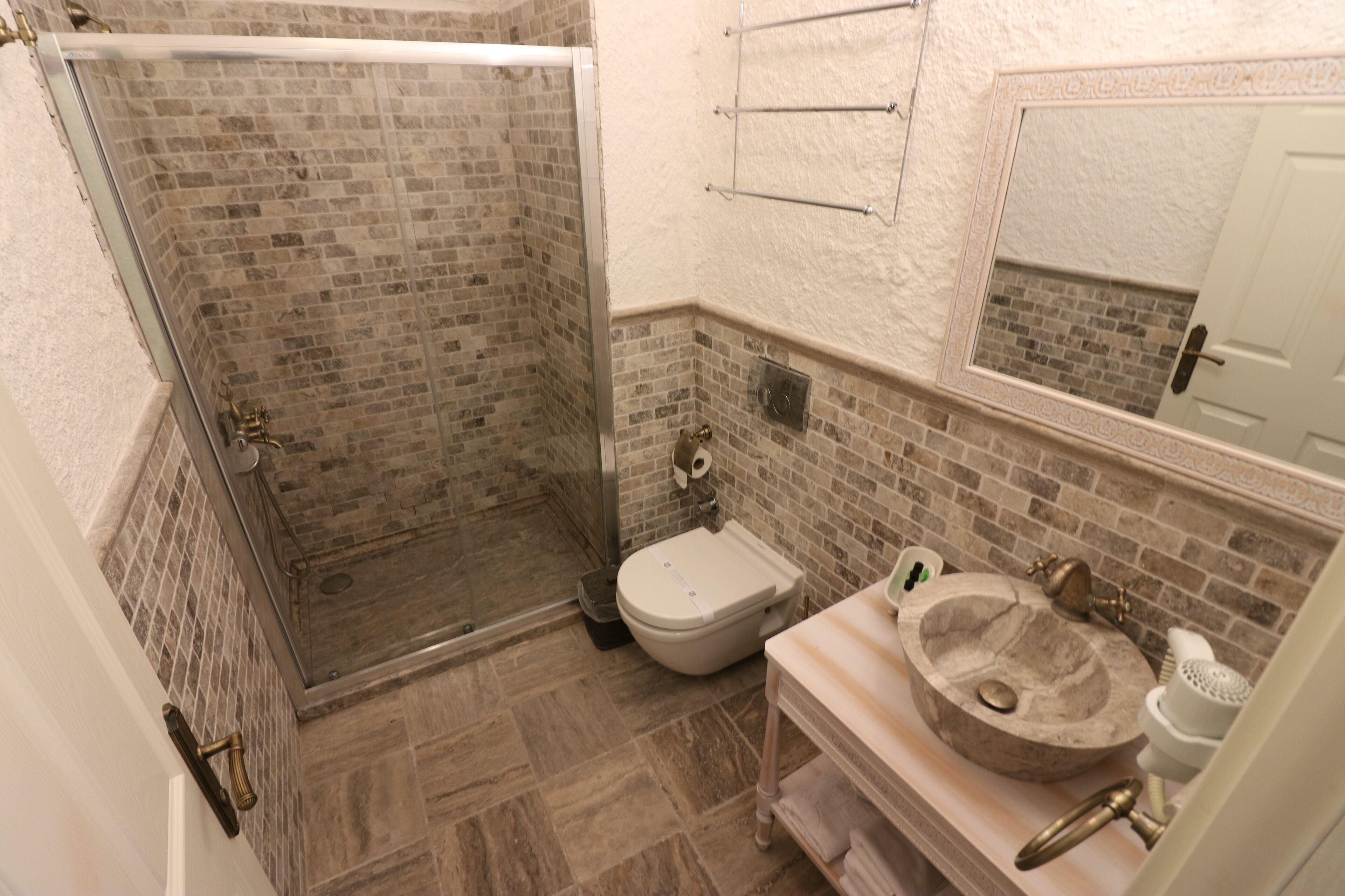 shower, hydromassage showerhead, designer toiletries, hair dryer