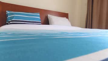 Deluxe Twin Room, 2 Single Beds | Premium bedding, individually decorated, individually furnished, desk