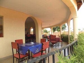 Breakfast, lunch, dinner served; local and international cuisine  - Plain Springs Hotel (Kumi)