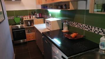 คลาสสิกอพาร์ทเมนท์, วิวภูเขา | ครัวส่วนตัว | ตู้เย็น, ไมโครเวฟ, เตาอบ, เตาประกอบอาหาร