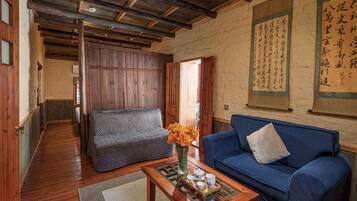 Chambre Double Deluxe | Coin séjour