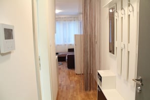 City Apartment, 1 Queen Bed with Sofa bed | Living area | Flat-screen TV