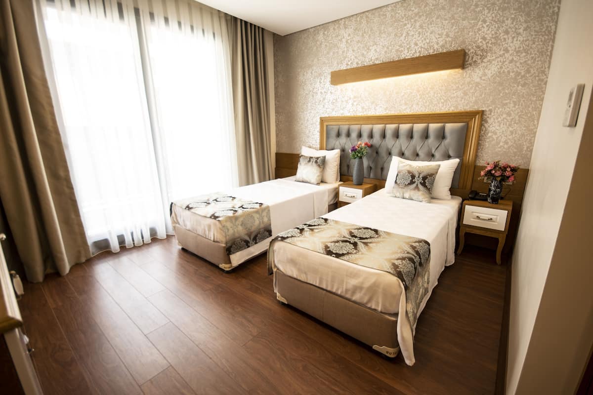 Egyptian cotton sheets, premium bedding, minibar, in-room safe