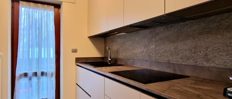 Oven, stovetop, dishwasher, coffee/tea maker