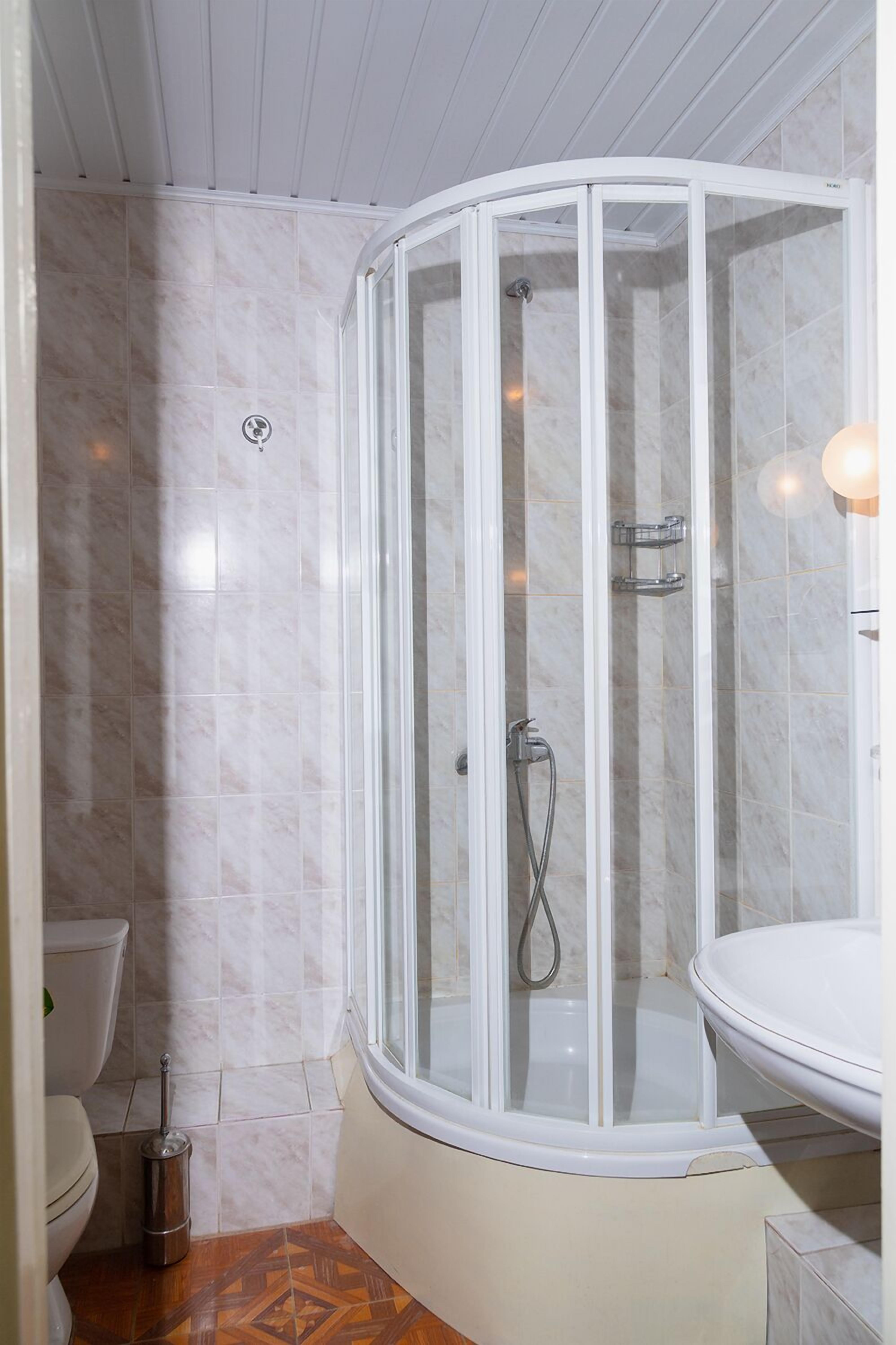 Economy Single Room | Bathroom | Shower, towels, soap, toilet paper