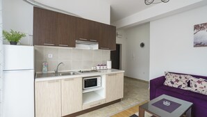 Appartement, 1 chambre, balcon | Coin séjour | Télévision