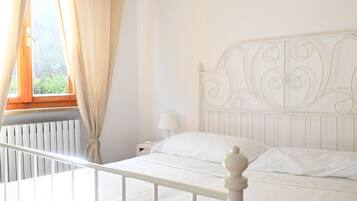 2 habitaciones y ropa de cama