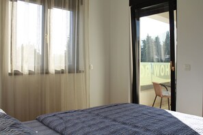 Familieleilighet, byutsikt | 1 soverom, strykejern/-brett og barnesenger (inkludert)