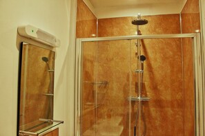Shower, free toiletries, hair dryer, towels