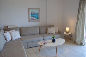 Panoramic Apartment, 1 Queen Bed with Sofa bed, Terrace, Sea View | Living area | Flat-screen TV