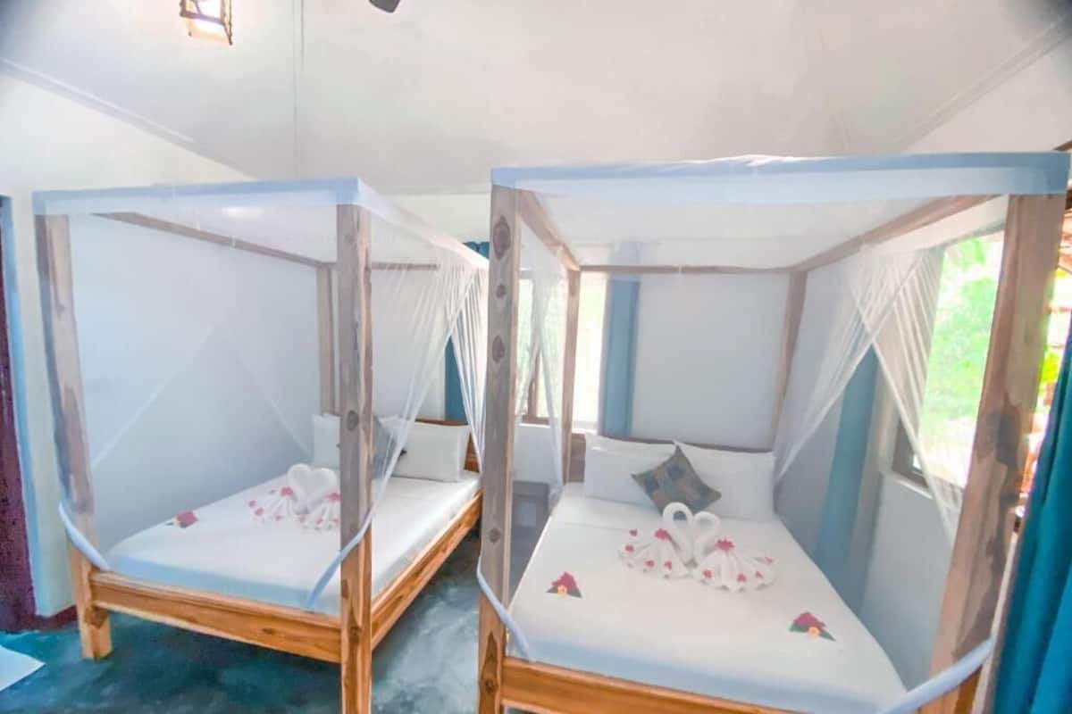 Family Bungalow, 2 Queen Beds, Garden View | 1 bedroom, in-room safe, individually decorated, individually furnished