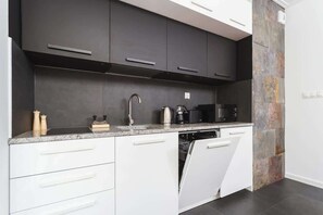 Microwave, stovetop, dishwasher, cookware/dishes/utensils