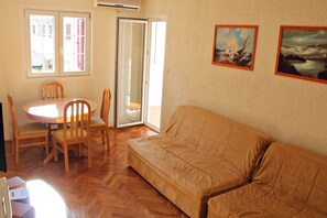 Apartemen Keluarga, pemandangan kota | Area keluarga | TV layar datar