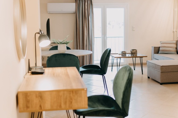Deluxe Apartment, 1 Queen Bed with Sofa bed, Kitchen, Courtyard View | Living area | Flat-screen TV