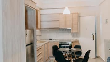 Panoramic Apartment, 1 Bedroom, Balcony, Marina View | Private kitchen | Full-sized fridge, oven, stovetop, coffee/tea maker