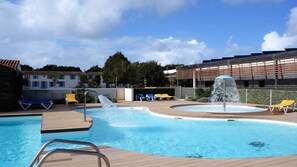 Seasonal outdoor pool, pool loungers