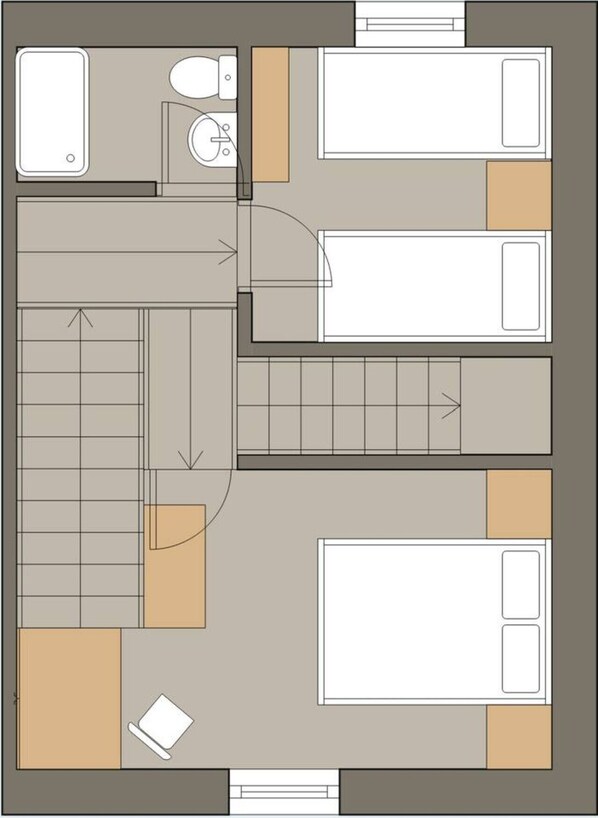 A floor plan of a hotel room with a bed, a desk, a chair, a wardrobe, and a bathroom.