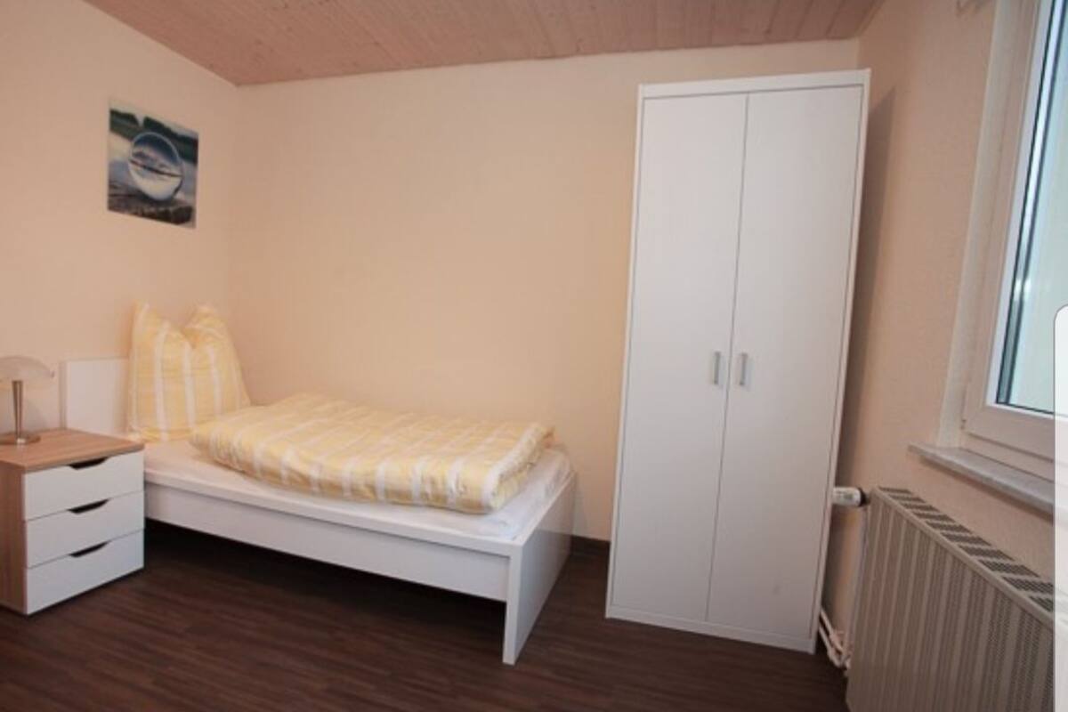 Quarto solteiro econômico, banheiro compartilhado | Wi-Fi de cortesia