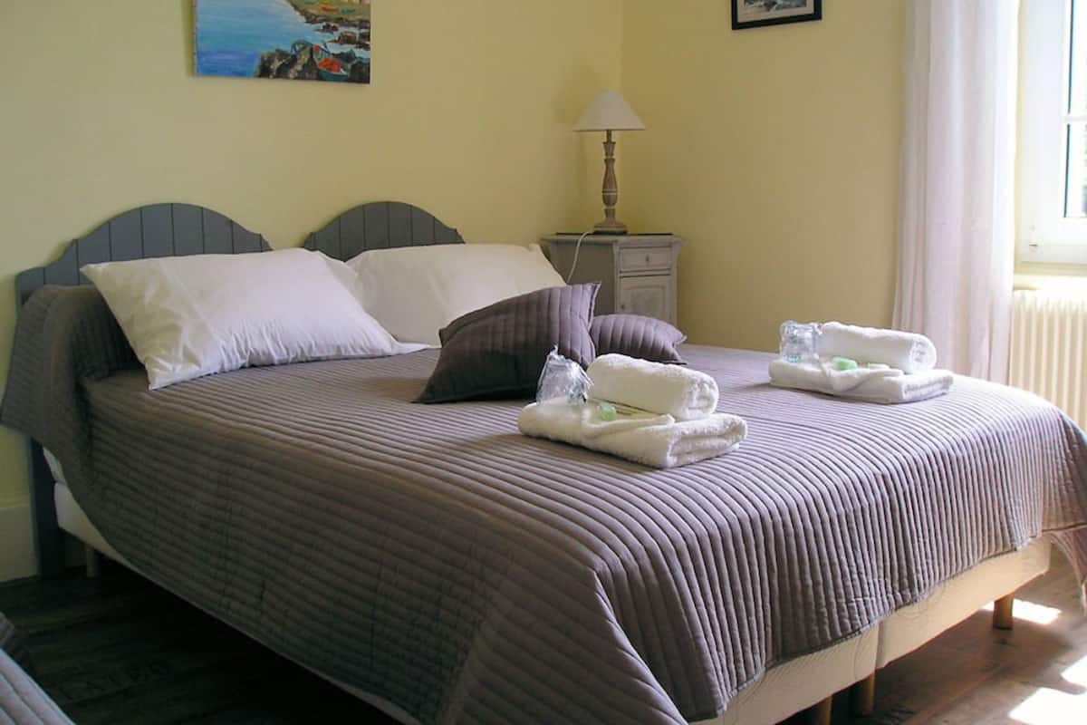 Memory-foam beds, desk, iron/ironing board (on request)