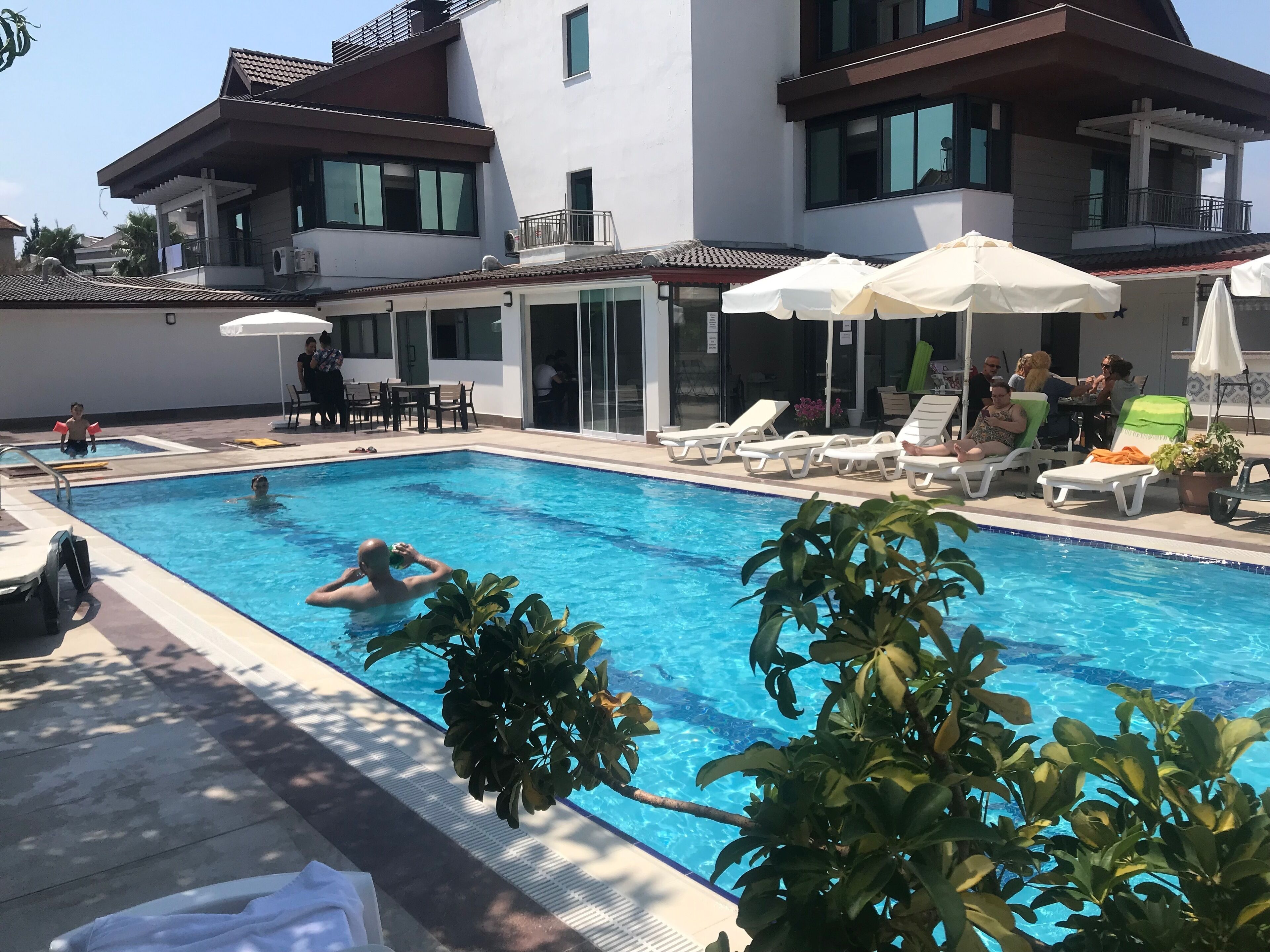 Outdoor pool, open 8:00 AM to 7:30 PM, sun loungers