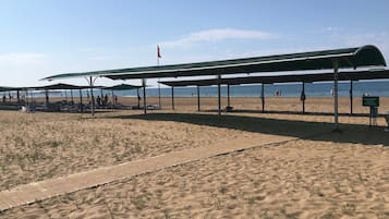 Beach nearby, sun-loungers, beach umbrellas