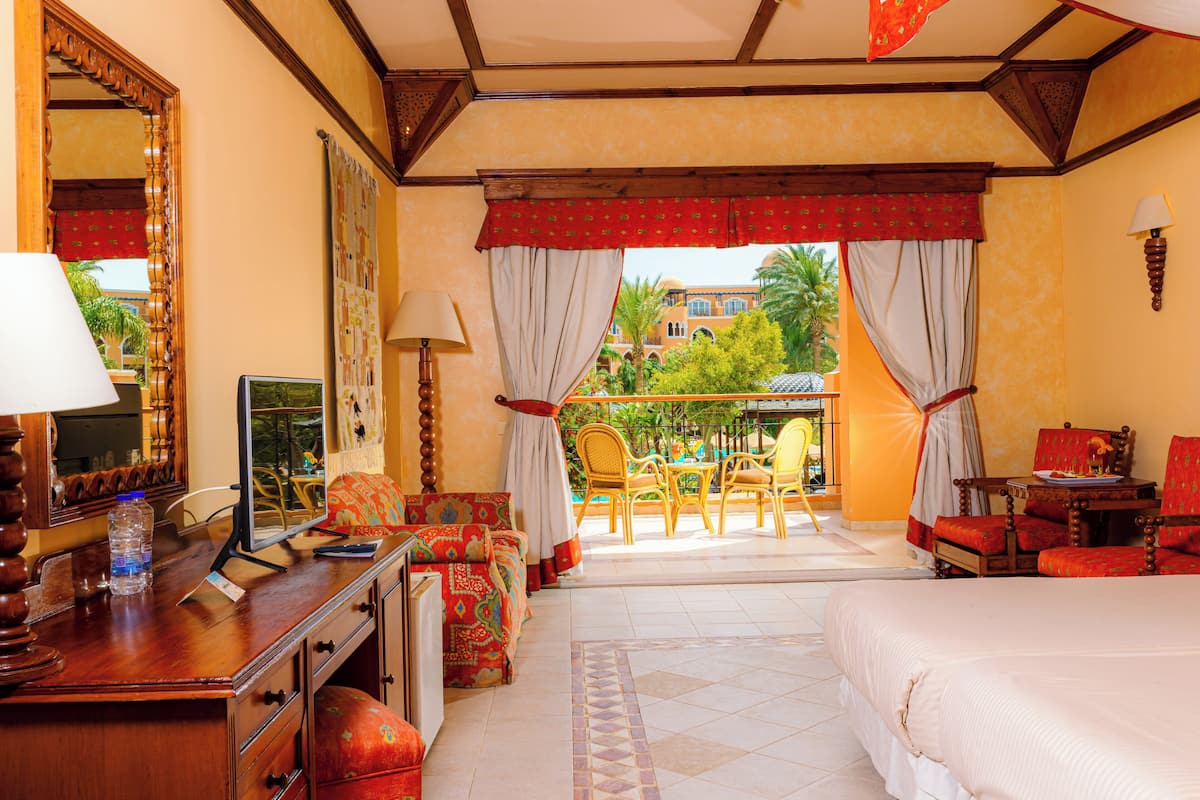 Chambre Deluxe | Minibar, coffres-forts dans les chambres, rideaux occultants