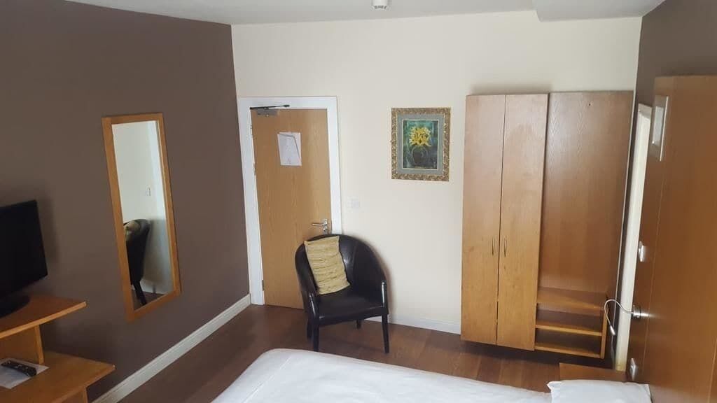 Desk, laptop workspace, free WiFi, bed sheets
