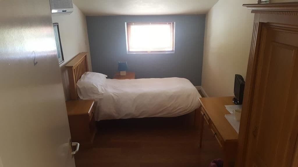 Desk, laptop workspace, free WiFi, bed sheets