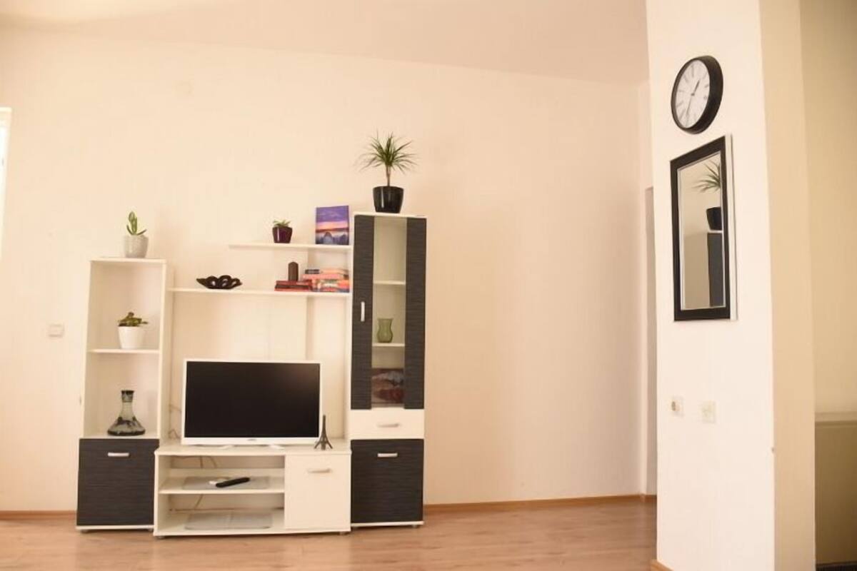Departamento superior | Área de sala de estar | Televisión de pantalla plana