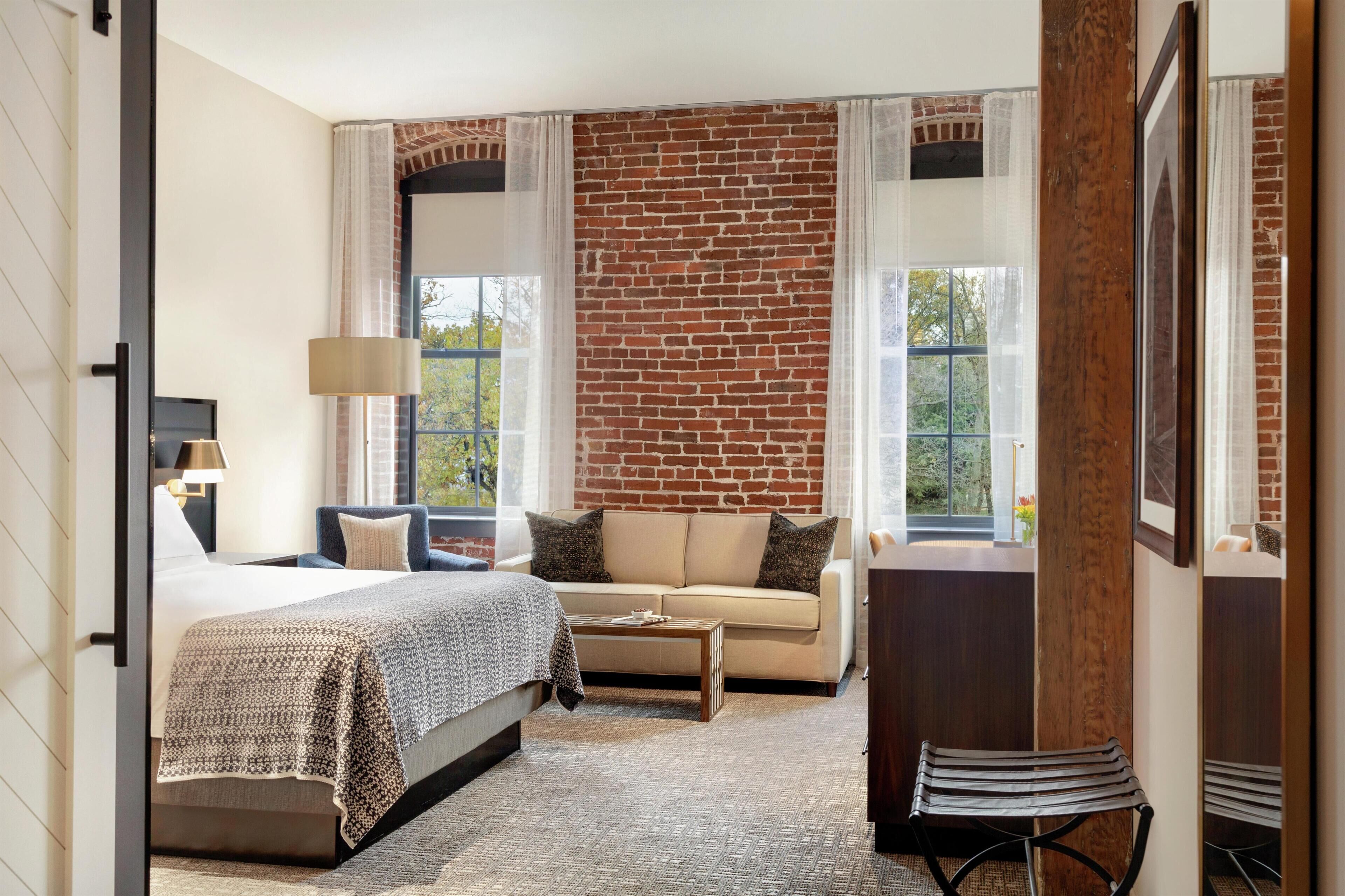 Suite, 1 King Bed | Living area | 50-inch flat-screen TV with satellite channels, TV