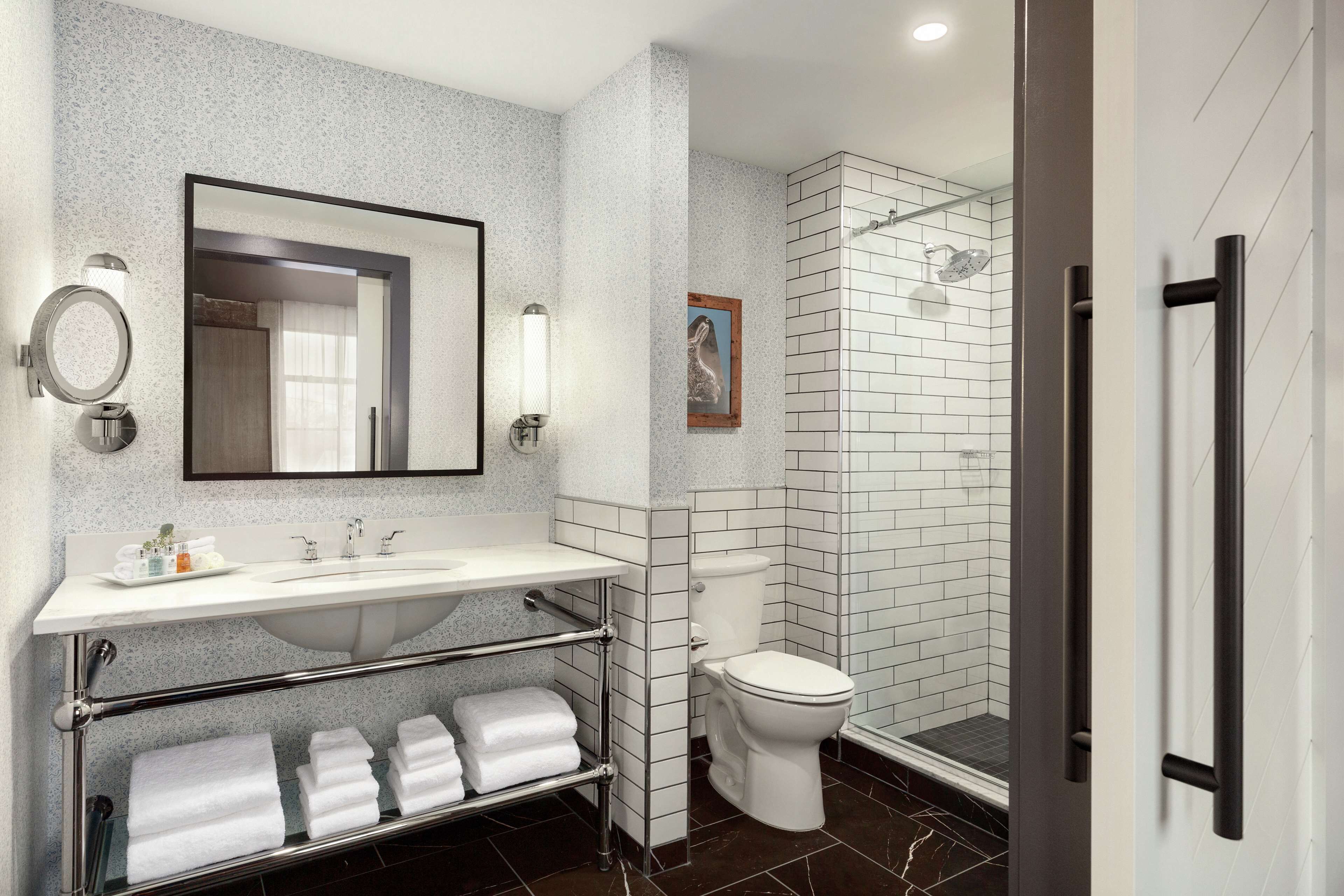 designer toiletries, hair dryer, bathrobes, towels