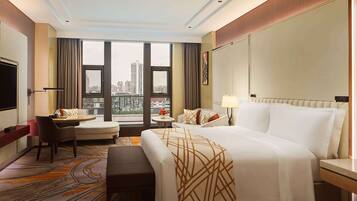 Premium bedding, pillow-top beds, free minibar items, in-room safe