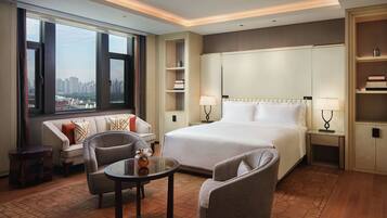 Premium bedding, pillow-top beds, free minibar items, in-room safe