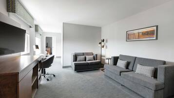 Suite, 1 King Bed, Refrigerator & Microwave (Wet bar) | Living area | LCD TV