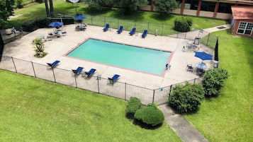 Outdoor pool, open 10:00 AM to 10:00 PM, pool umbrellas, pool loungers