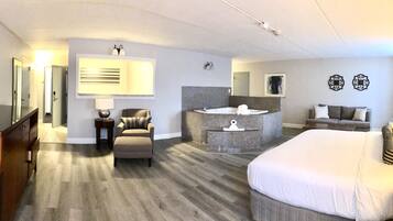 Honeymoon Suite, 1 King Bed, Non Smoking | 1 bedroom, down comforters, desk, laptop workspace