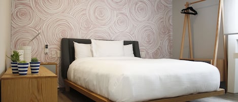 Premium bedding, down comforters, Select Comfort beds, in-room safe