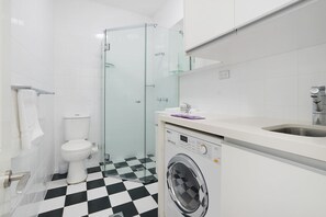 Shower, hair dryer, towels