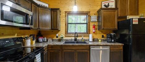 Coffee/tea maker, fridge, microwave, oven