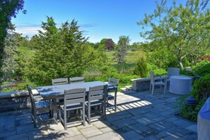Outdoor dining - Three bedroom cape with water views-Only .2 miles to Seaview Beach (Dennis Port)