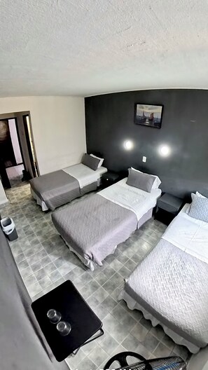 Triple Room, 1 Bedroom, Private Bathroom | Minibar, free WiFi, bed sheets