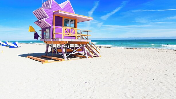 A lifeguard tower on a beach with clear skies. - Cardozo Hotel South Beach (Miami Beach)