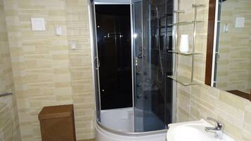 Shower, hair dryer, towels, soap