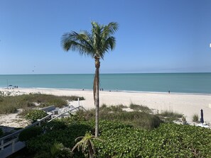 On the beach, sun loungers, beach towels