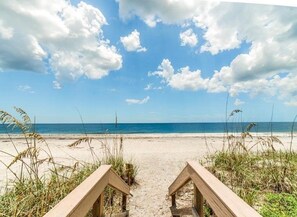 On the beach, sun loungers, beach towels
