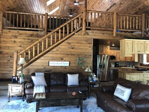 Télévision, cheminée, table de tennis de table