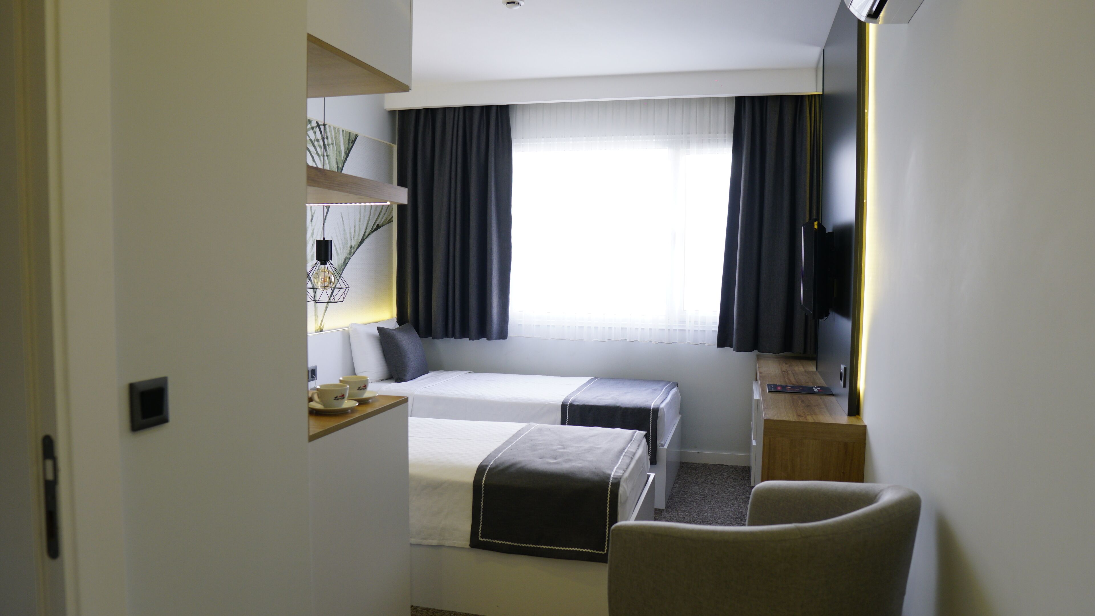 standard twin room, city view | 1 bedroom, premium bedding, minibar, individually decorated