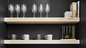 A modern kitchen with two wooden shelves, a sink, and various kitchen appliances. - Absolute Luxury! Sleeps 16! RoofDeck/Gym/Wet Bar (Philadelphia)