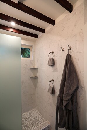 Shower, hair dryer, towels, soap